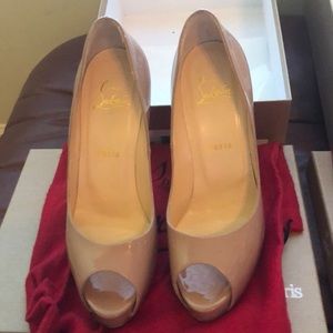 Designer heels, worn twice.